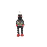 A Yoshiya K.O (Japan) Clockwork High Wheel Robot, black tinplate body, red hands and feet, six