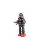 A Yoshiya K.O (Japan) Key Wound Planet Robot, early version with rubber hands, black tinplate