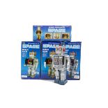 Chinese Space Walk Man Robots, four Battery-operated tinplate robots, all silver, in original boxes,