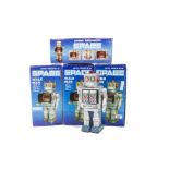 Chinese Space Walk Man Robots, four Battery-operated tinplate robots, two silver, two blue, in