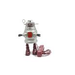 A Nomura T.N (Japan) Battery-operated Remote-control Pug Robby Piston Action Robot, silver