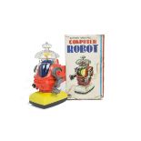 A Bandai (Japan) Battery-operated Computer Robot, orange plastic body, yellow base, silver arms,