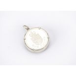 A 1988 piedfort silver one pound coin, in a pendant mount