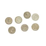 Seven George V half crowns, all VF-EF, with dates for 1914, 1915, 1916, 1917, 1918, and 1923 and