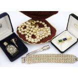 A collection of silver and costume jewellery, including a miniature kukri dagger brooch, a