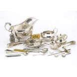 A small collection of silver plated items, including a novelty owl vesta case, sauce boat, spoons