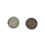 Two Queen Anne shillings, one 1707, VF-EF, and one 1709, VF (2)