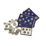 A collection of 20th century British coins, including a 1935, 1937 and 1951 crown, along with