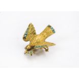 A 19th century gold dove of peace mourning brooch, set with turquoise beads, two lacking, carrying a