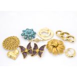 Ten fashion brooches, including one by Christian Dior, Christian Lacroix, YSL, Trifari, Monet and