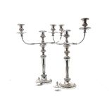 A pair of Edwardian period Sheffield silver plated candleabra, each with two branches, 52cm high (2)