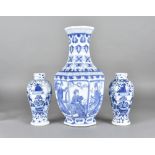 A pair of Chinese porcelain blue and white ovoid vases, each with four character marks to the