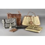 A group of early 20th Century animal skin handbags, two of snake skin, one of crocodile skin and one