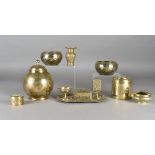 A collection of 20th Century Middle-Eastern and Indian brass items, including a pair of brass