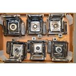 A Tray of Six Miniature Press Cameras, including Speed Graphic (2) a Busch Pressman, a Tower