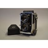 A Mamiya C220 Medium Format TLR Camera, with Mamiya/Sekor 80mm f/2.8 lens, shutter sticking, lugs