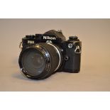 Nikon FM2 35mm SLR Camera, with zoom Nikkor 43-86mm f/3.5 lens, brassing to body, elements G,