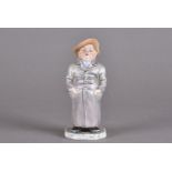 A 19th Century Royal Worcester figurine of a Dickensian character, impressed marks to base, 14.1