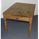 A 19th Century pine kitchen table, fitted frieze drawer, 125 cm wide x 82 cm deep x 73 cm high