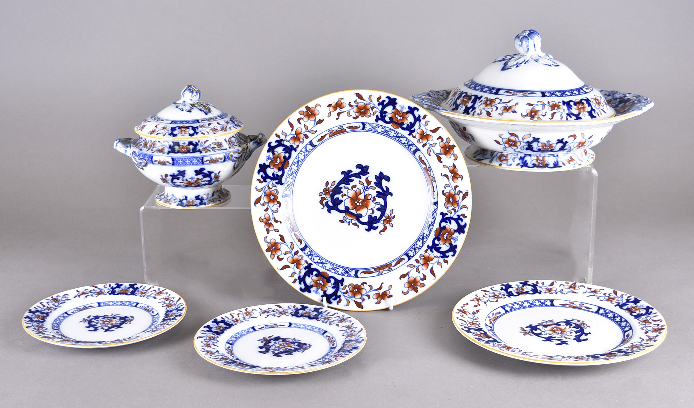 A Minton Imari dinner service in pattern no. 8667, including 11 dinner plates, 12 dessert plates,