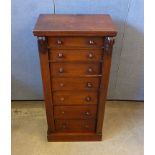 A Victorian walnut Wellington chest, seven graduated drawers, turned handles one missing, locking