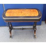 A Victorian ebonised and burr maple oval turnover-top card table, turned stretchered supports with