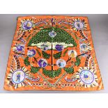 A modern Hermes L'Ombrelle Magique silk scarf, narrative roundels, orange ground, 86 cm sq.