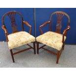 A pair of 19th Century mahogany elbow chairs, pierced back splat, floral fabric seats, tapered