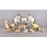 A collection of ceramic models of pugs, including Sylvac example, tobacco jar etc, smallest 7.5 cm