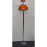 A mid 20th Century chrome adjustable standing floor lamp, orange shade