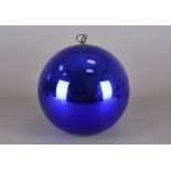 A cobalt blue lustrous glass witch's ball, brass hanging, approx. 25 cm diameter