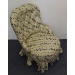 An Edwardian floral button backed nursing chair