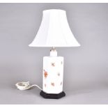 A Herend porcelain octagonal table lamp, Chinese red rust floral decoration, white shade, 53 cm high
