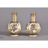 A pair of Satsuma miniature bottle vases possibly by Kinzangama, each with four panels decorated