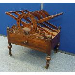 A Regency rosewood Canterbury, wreath decoration, above single drawer, turned supports and