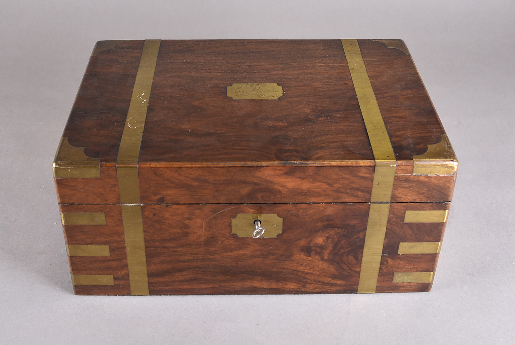 A late 19th Century mahogany brass bound writing slope, brass cartouche to lid and brass - Image 2 of 2