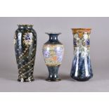 Three Royal Doulton Art Nouveau tubelined vases, including a baluster example, flared rim, decorated