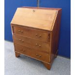 An Edwardian inlaid mahogany bureau, three drawers, bracket supports, 77 cm wide x 43 cm deep x 99