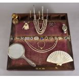 A small collection of jewellery and other related items, including a silver dressing table mirror, a