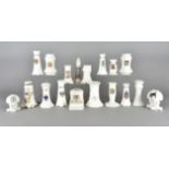 A collection of late Victorian and early 20th Century crested china hatpin holders, some in form