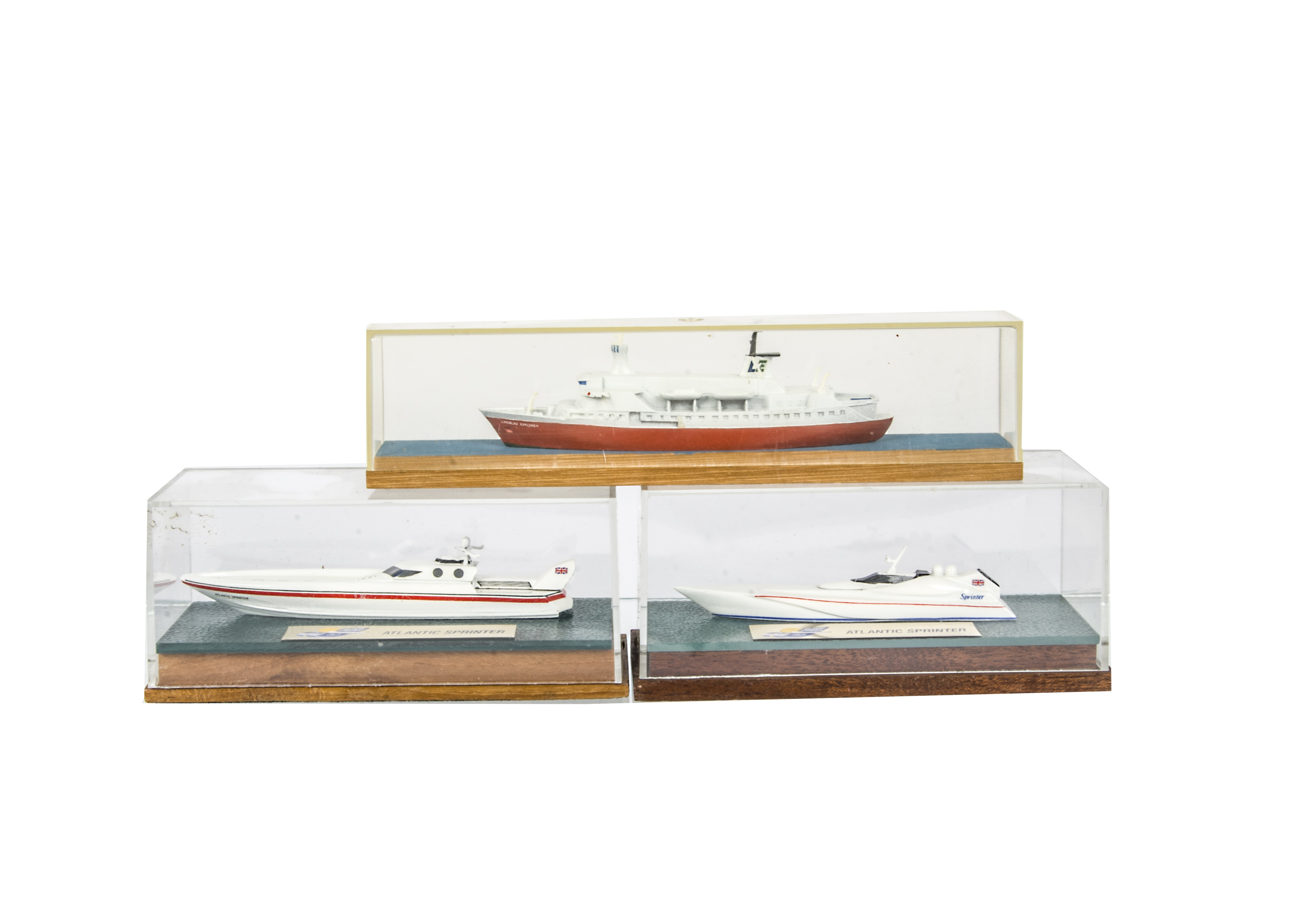 Modern image waterline models in Perspex display cases, two different RAE Models of Atlantic