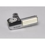 A Nikon F Accessory Light Meter, model III, serial no. 207948, reponds to light, condition G, with