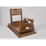 A 19th Century mahogany and walnut-veneered Rowsell's Patent Graphoscope, with retailer's plate