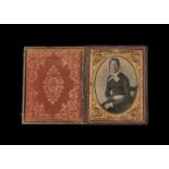 Cased Portrait Daguerreotypes of Ladies, quarter-plate of lady with lace cap and lappets and gilt-