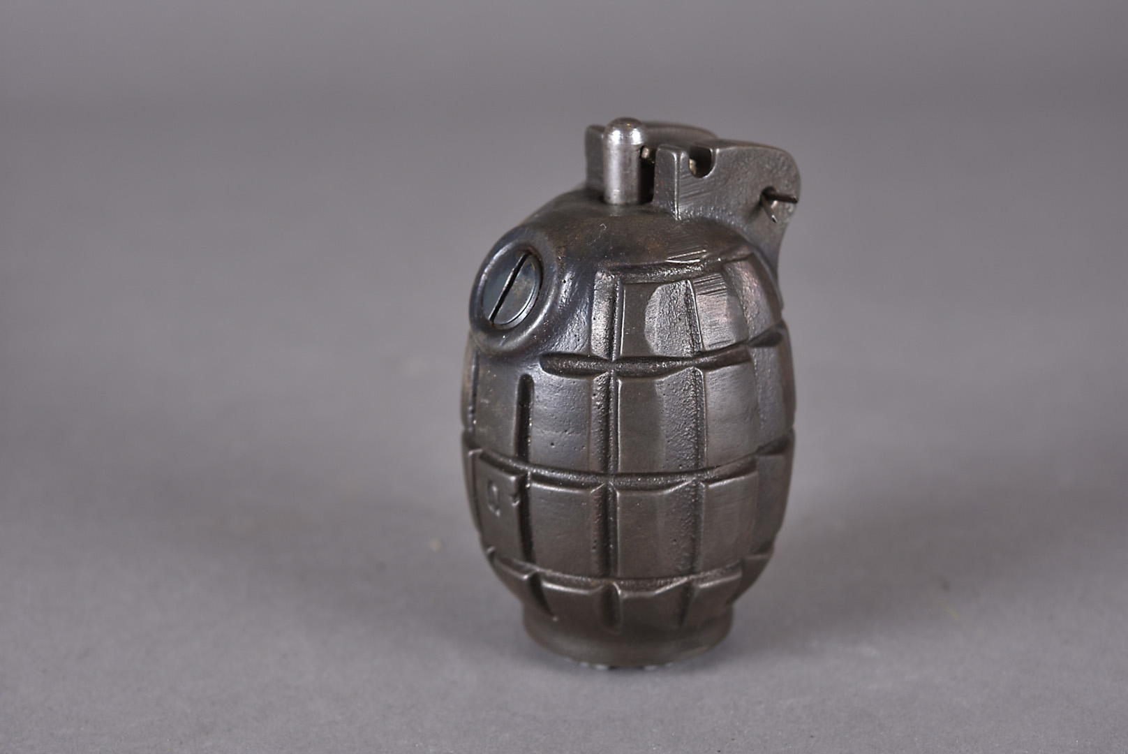 A WWII No.36M MkI hand grenade, marked to the base plus WD, also marked Q to the body, complete with
