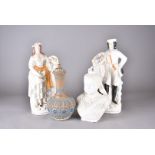 A pair of 19th Century Staffordshire figures, huntsman and female companion, 40 cm high; a Turner