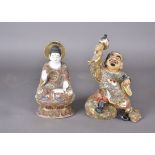 A late 19th Century Asian stoneware figure of seated deity, upon lotus leaf, heightened in gilt with