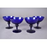 A part suite of Bristol Blue glass, including five large wine goblets, nine white wine goblets, 13