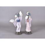 Two Lladro figurines, modelled as Japanese Geishas with fans, 31 cm high and 29 cm high, both boxed