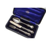 A cased Victorian silver three piece Christening set, marked SH DC, in a Poile & Smith fitted